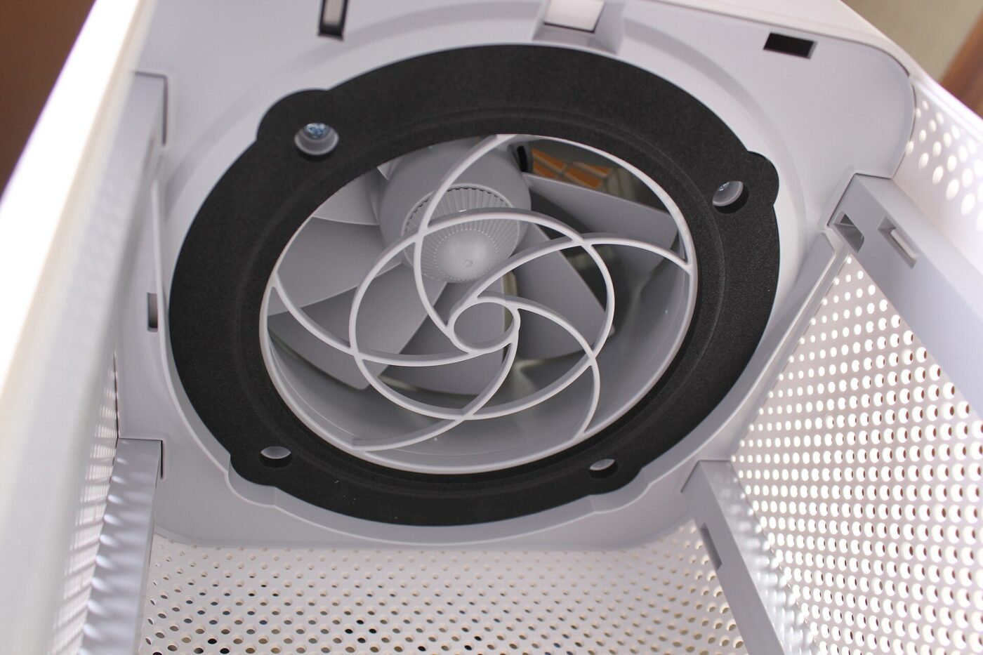 The fan inside a room air purifier, seen from above with the filter taken out