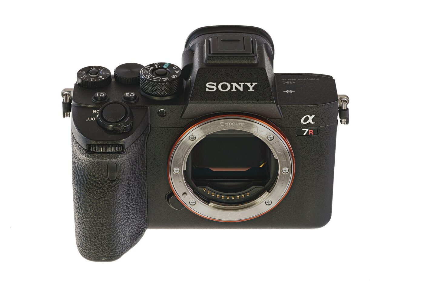 A Sony Alpha mirrorless camera body with no lens attached, showing the lens mount and sensor
