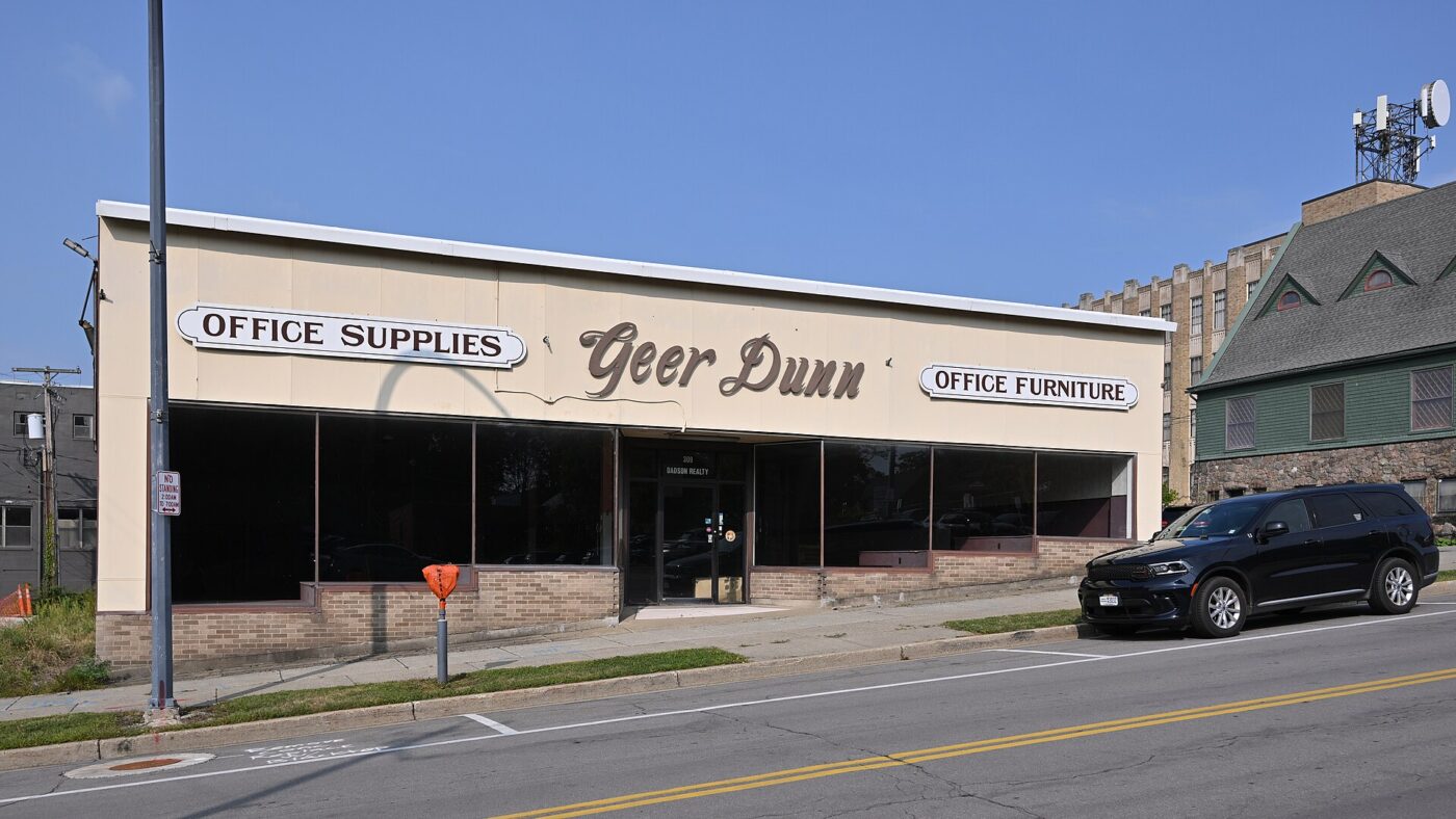 An independent office supply and furniture store on a street in a small city