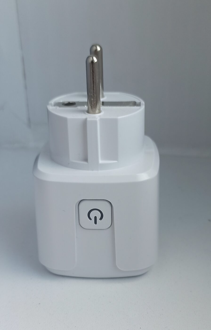 A white smart plug adapter with a single power button, shown against a plain background.