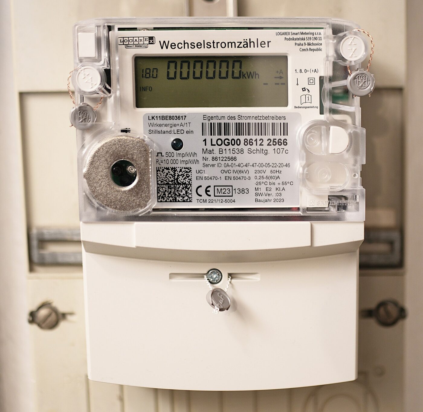 A modern household electricity meter with a digital display of kilowatt-hours used.