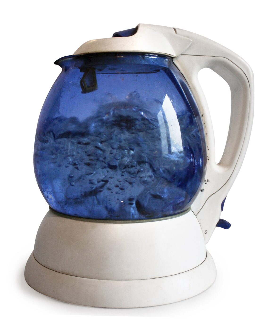 A round blue-glass electric kettle filled with water, sitting on its separate power base.