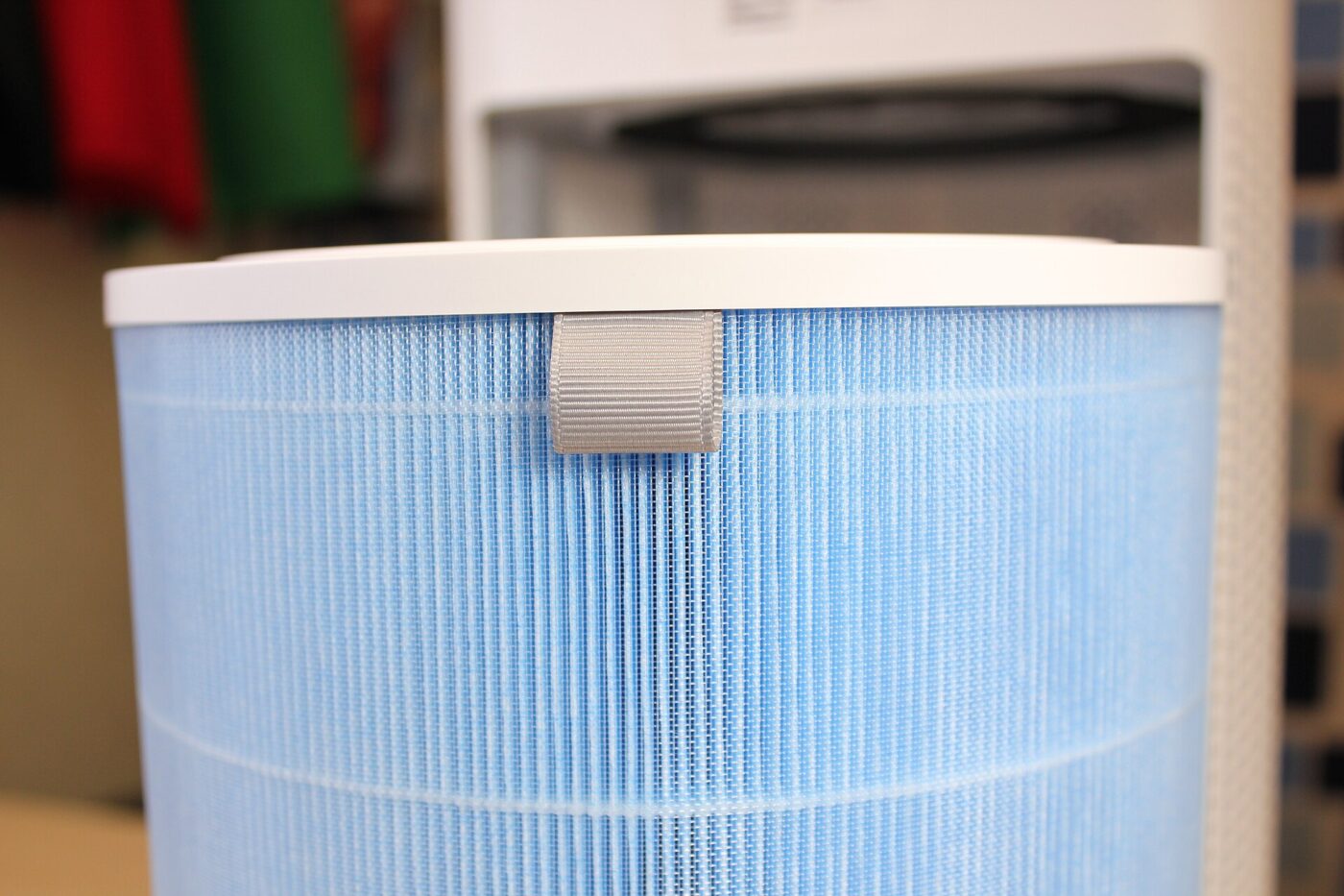 Close-up of the pleated media on a cylindrical air purifier filter.